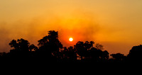Sunset through the smoke of bush fires.