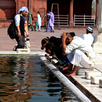 Preparing for prayers at the Jama Masjid, the great mosque of Delhi.