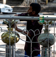 Brass polishing at Gangaramaya Temple, Colombo.